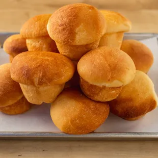 a pile of bread rolls