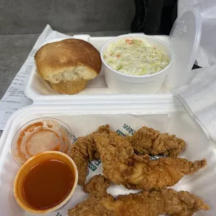 Spicy chicken tenders, hot sauce, &amp; slaw