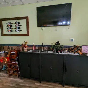 This is a table with a Cozy up sign in the restaurant.  Photo taken October 2, 2022.