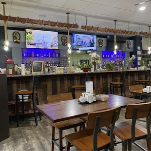 The front bar with a couple of tables