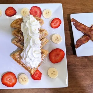 This is the Bread Box Waffles Breakfast Entrée.  Bacon was separate on the side.  Photo taken July 16, 2023.