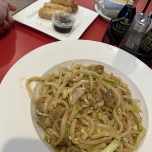 Undo chicken noddles with side of egg rolls