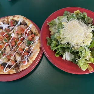 Caesar salad and Chicken Fajita pizza