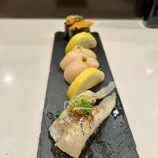 Halibut fin, scallops, uni sushi.
