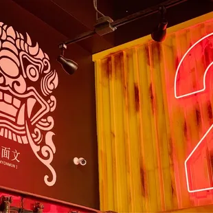 a neon sign for a chinese restaurant