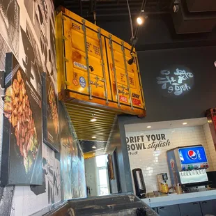 interior - eclectic decor! shipping containers, tailgates and chandeliers!