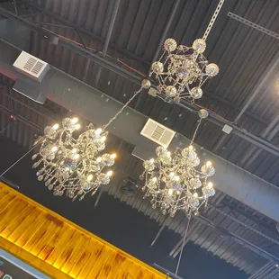 interior - eclectic decor! shipping containers, tailgates and chandeliers!