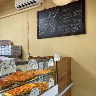 pizzas on display