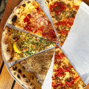 (From the top) Meatball, The Partanna, clam, cacio e pepe, hot sausage &amp; brown butter sage