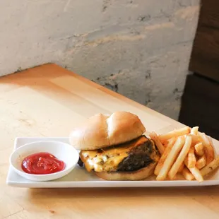 The Check-in -  Single Patty, American Cheese, Onion, Ketchup and Mustard