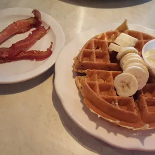 Banana nut Belgian waffle and side of bacon