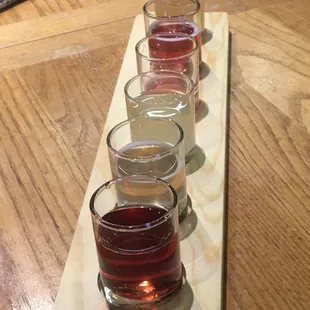 a row of glasses of wine