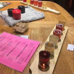 a flight of beers on a table
