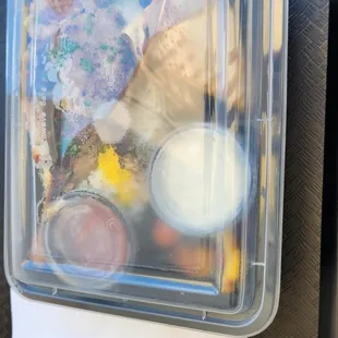 Served in a to go container. Ate on the patio