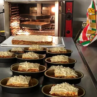 a pizza baking in the oven