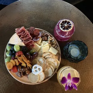 Mini charcuterie board from Fable and cocktails from Harvey's Bar