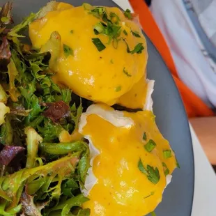 Eggs Benedict over focaccia with Mixed Greens
