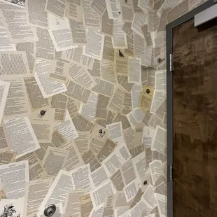 Decor has real attention to detail. Even the restroom has pages from your favorite fantasy novel as wall paper!