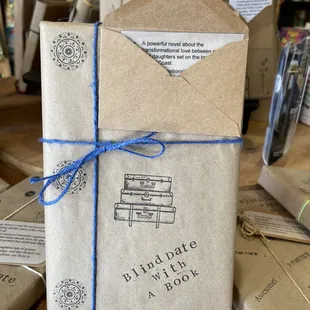 Blind date with a book. They wrap and write clues so you can figure out what the book is.