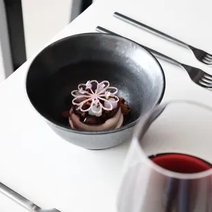 Sour cherry cheesecake, tonka bean panna cotta, sake gel, poached cherries