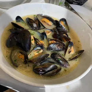a bowl of mussels and clams