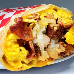 On the go? Start your day with a Bacon and Sausage Breakfast Burrito!