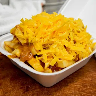 Now smother it with fresh sliced cheddar cheese!