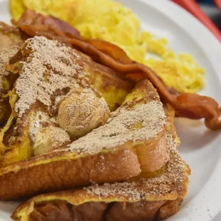 What a delight! 2 Eggs + 2 Bacon or Sausages + 2 French Toast made with 100% Pure Vanilla!