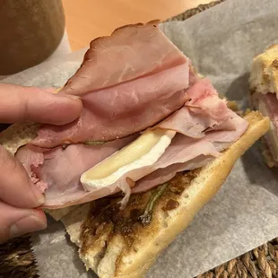 What is a ham Brie Sandwich is a crunchy hard toasted baguette with tiny slice of Brie and some sweet crap on it for $9 +. No!!!