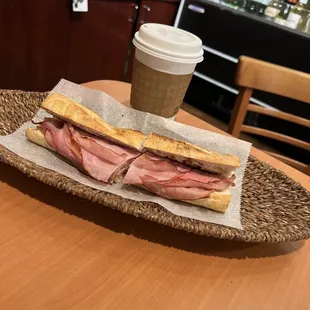 What is a ham Brie Sandwich is a crunchy hard toasted baguette with tiny slice of Brie and some sweet crap on it for $9 +. No!!!