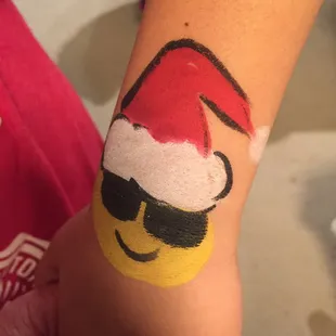 Emoji with Santa hat