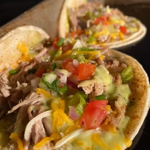 two tacos on a tray