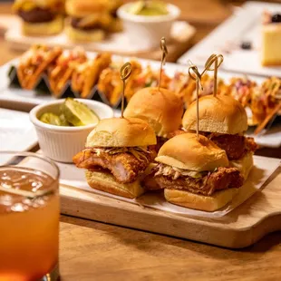Mini Burgers - 3 potato roll, Pat LaFrieda short rib patty, cheese, ketchup, pickles
