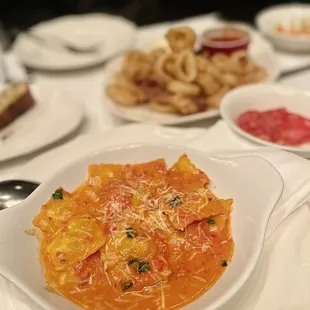 a plate of pasta and other dishes