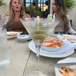 Martinis with blue cheese stuffed olives and friends