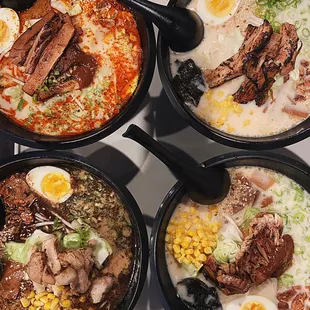 Top left to right: spicy miso ramen, tonkotsu ramen 
Bottom left to right: black garlic oil ramen, miso ramen