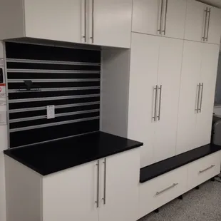Slat walls and custom garage cabinets. Many color options and sizes available. Overhead, base, and pantry style.