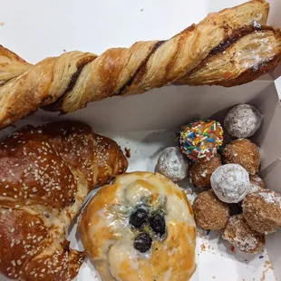 Cinnamon twist, blueberry scones, pretzel croissant, Donut hole