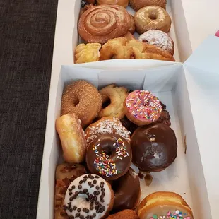 Two dozen yummy donuts