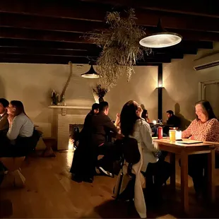 a group of people sitting at a table