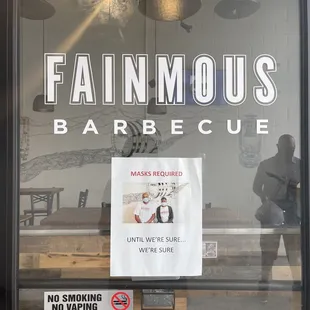 a sign in the window of a restaurant