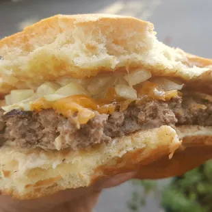 Bites into the Bombburger from Musangtino&apos;s at Fair Isle Brewing (6/22/21)