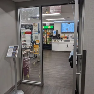 Inside the office building but outside of the deli proper.