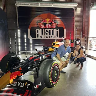 Just posing with cars for F1, no big deal