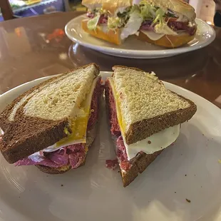 Pastrami on rye (front) &amp; pastrami on french roll (back)