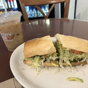 Iced vanilla almond latte with vegan sandwich