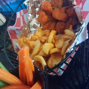 Boneless Chicken Wings with fries and celery and carrot sticks