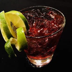 a drink with a slice of lime