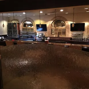 a view of the bar from the dining room