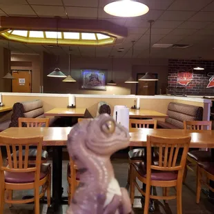 Bob the Raptor says "Nice dining room!"